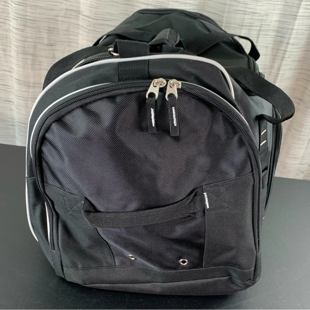 A Black 100th Anniversary Duffel Bag (Masonic?).